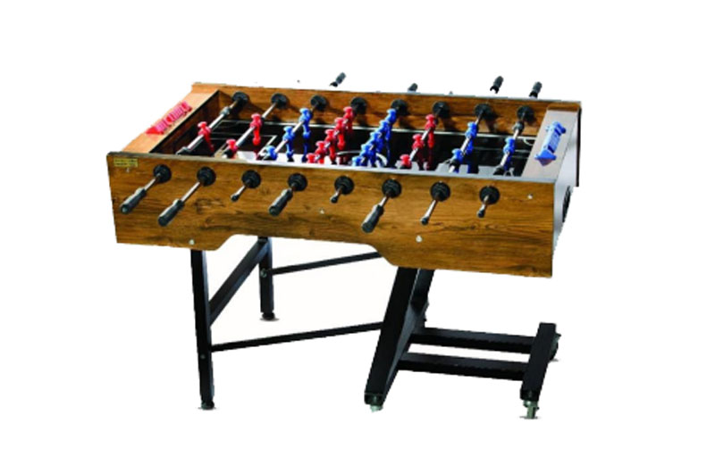 brown foosball table with base